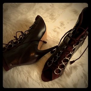 Brian Atwood lace up bootie heels size 7.